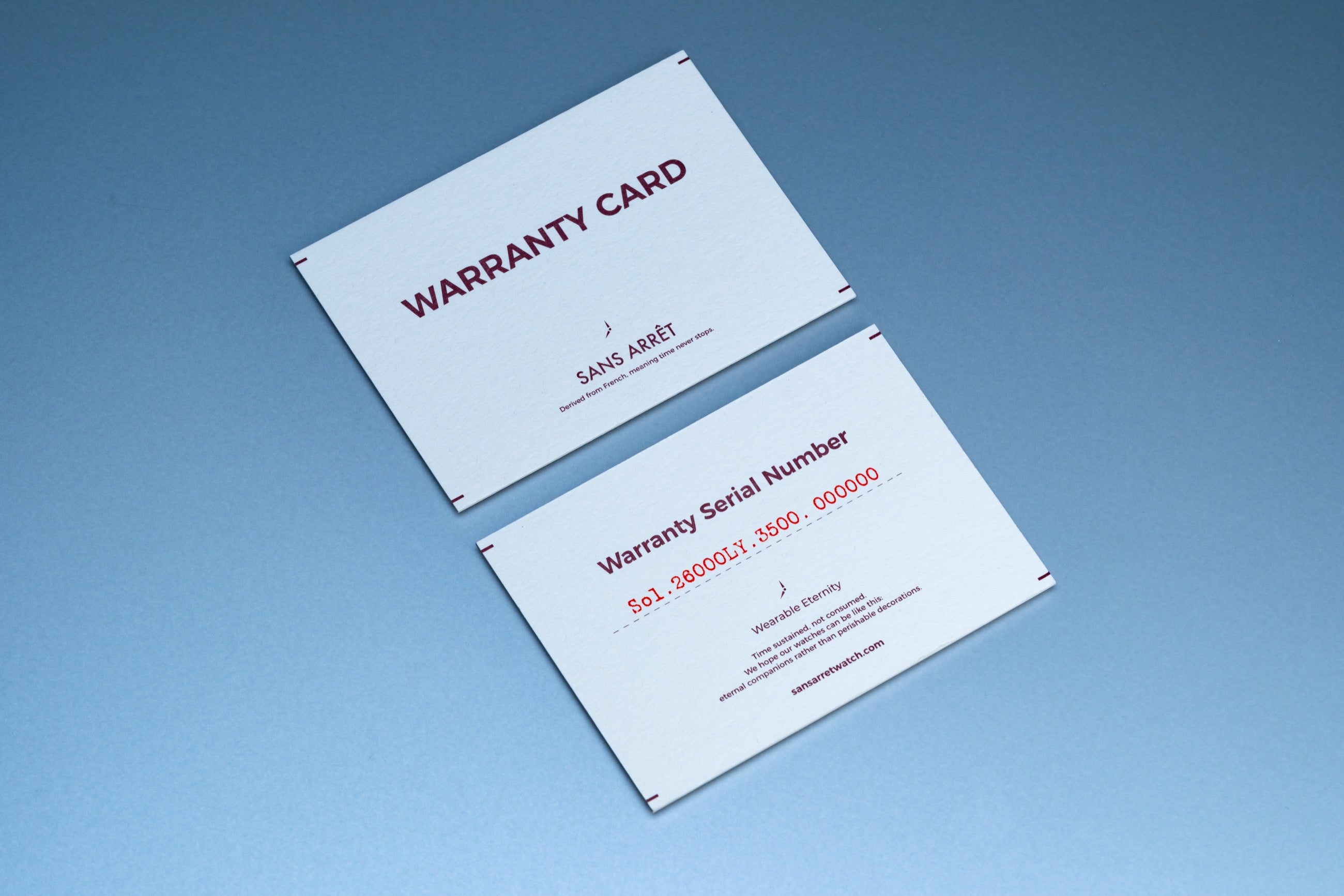 SANS ARRÊT warranty cards showing the serial-number system